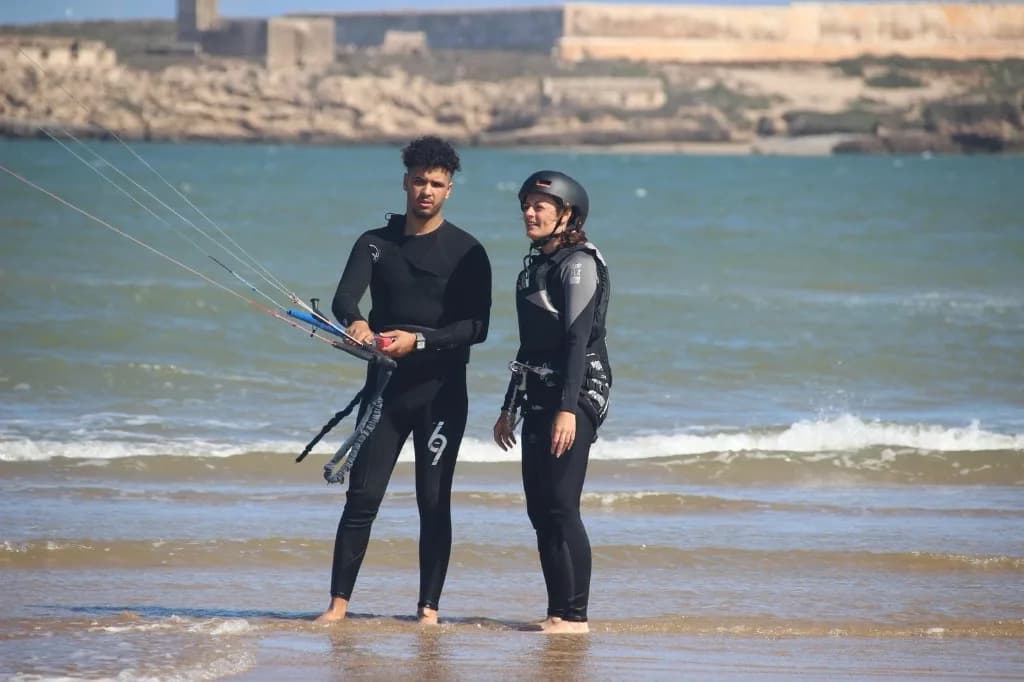 Semi-private kitesurf lesson at Essaouira with ramparts in background